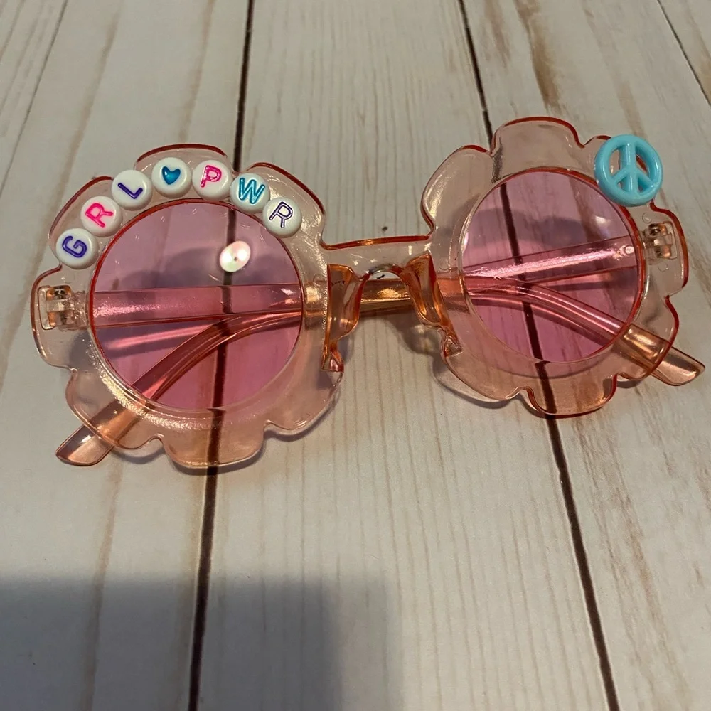 Girls pink see through flower shaped grl pwr sunglasses